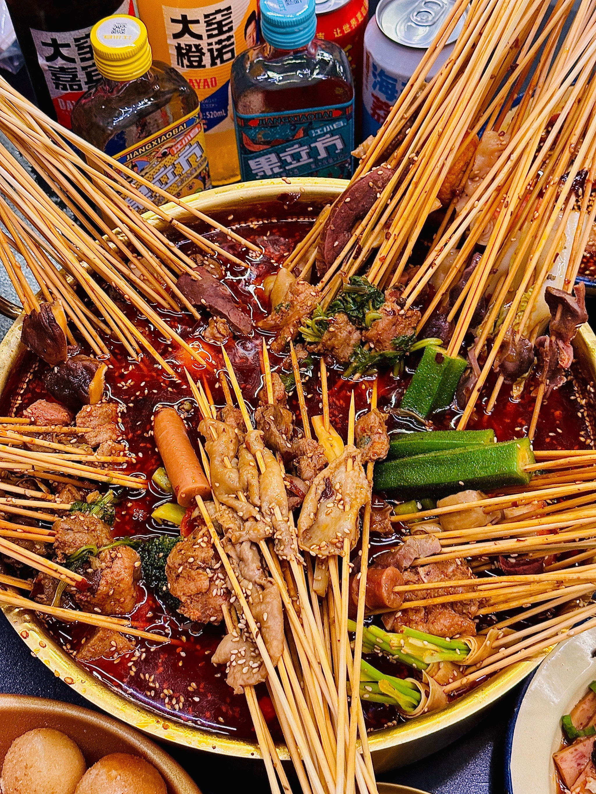 A large platter of Sichuan skewers cooked in spicy mala broth